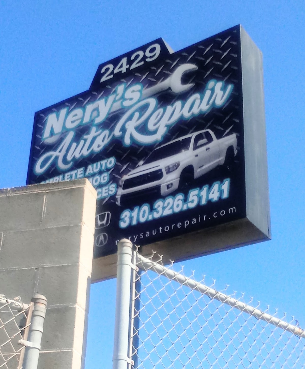 The Nery's Auto Repair street sign at 2429 Lomita Blvd
