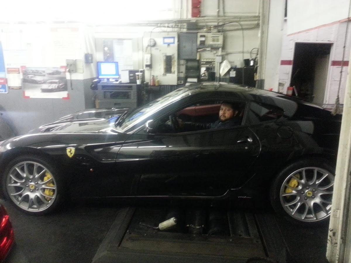 A Maserati GranTurismo inside the workshop at Nery's Auto Repair